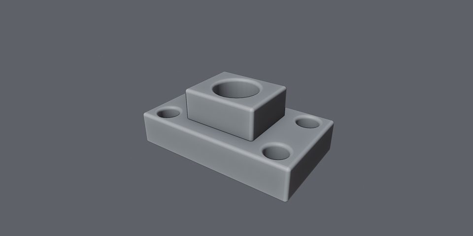A machined bracket with bores and filleted edges, shown with the CAD-edge overlay
